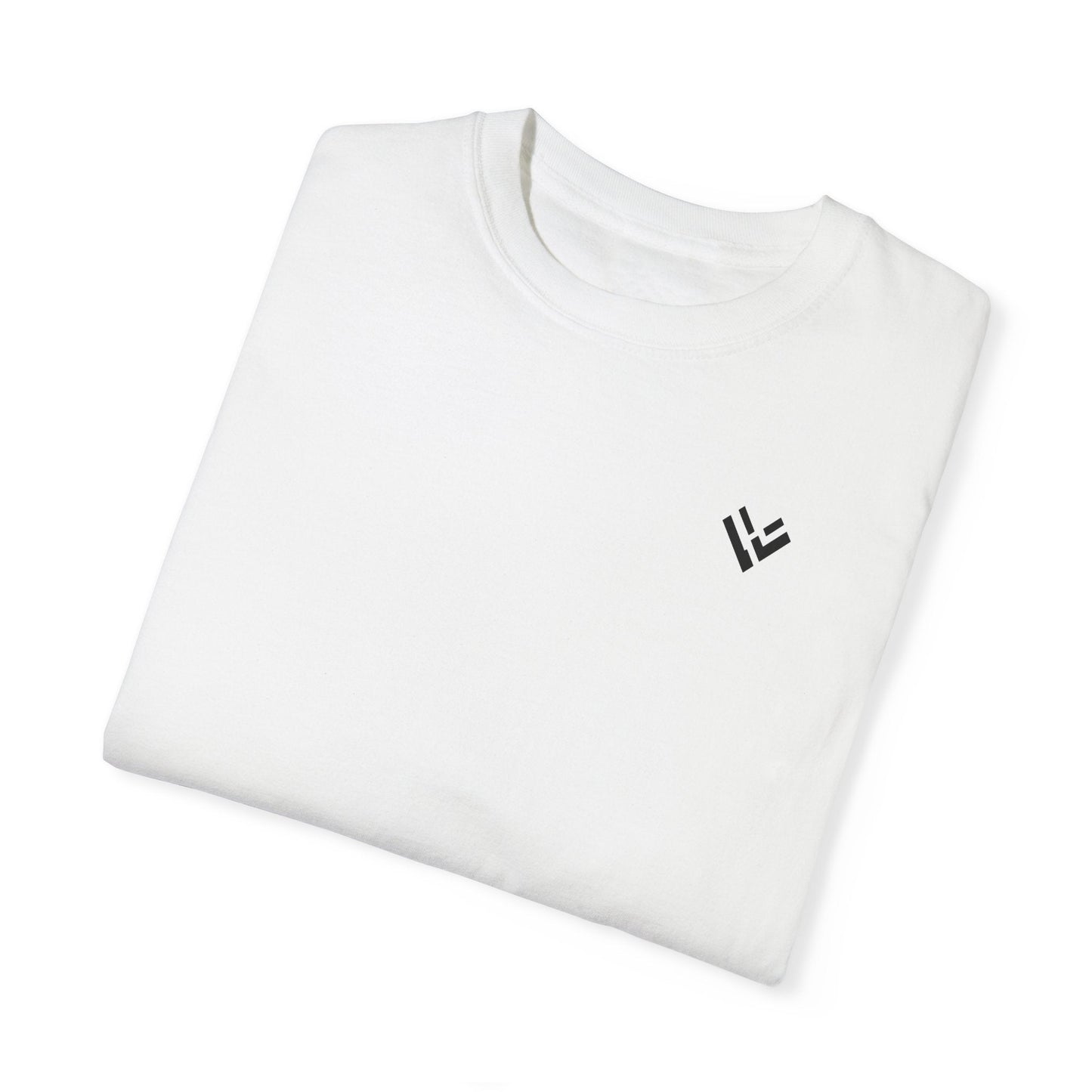 Folded view of the white Masculine Art cotton t-shirt, highlighting the fabric texture and the small black Vytal Motion (VM) logo on the left chest